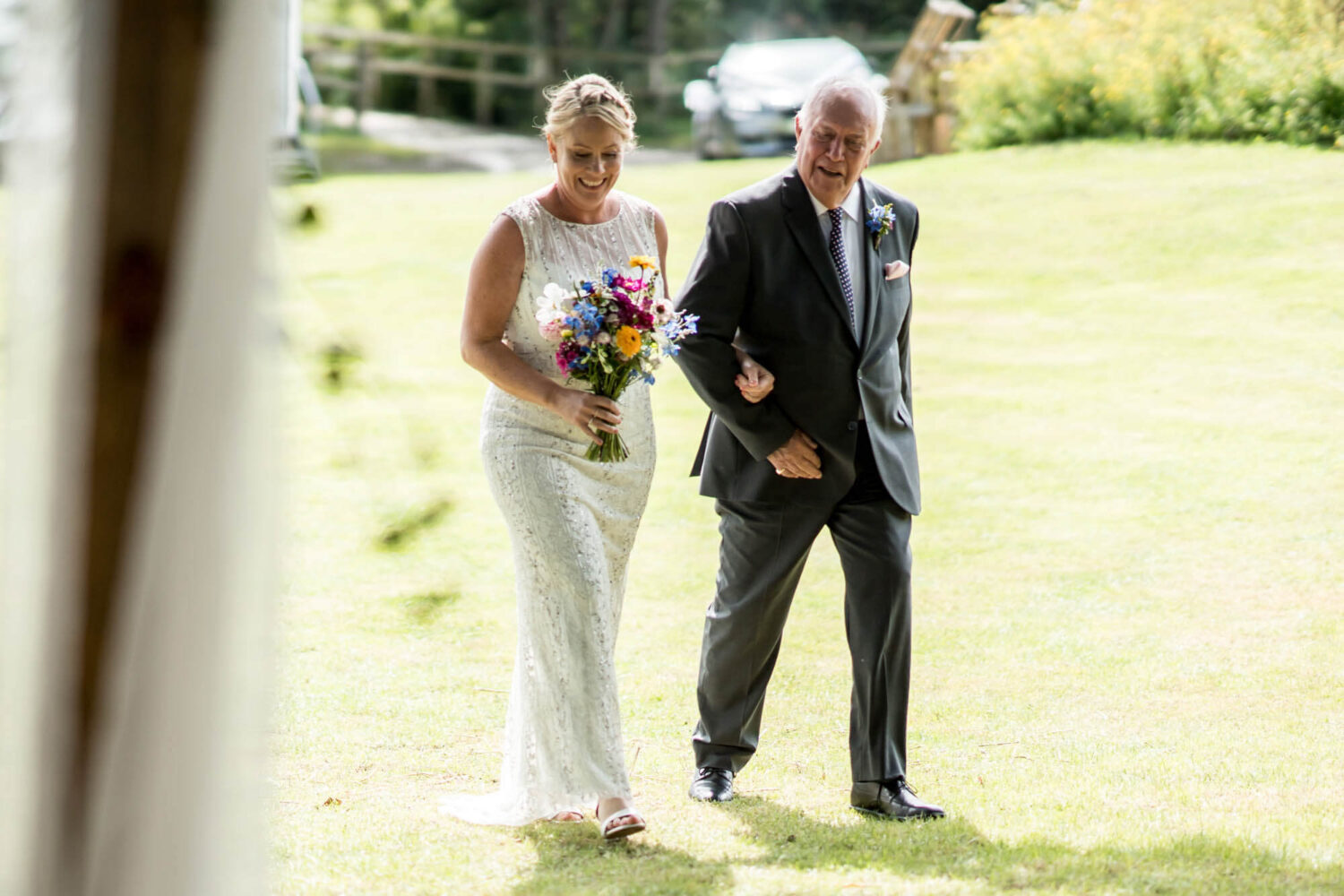 bride and father enter ceremony area