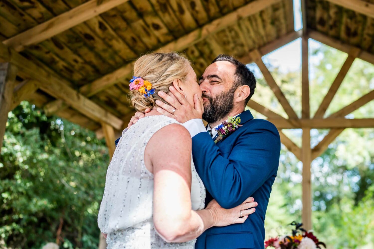 bride and groom kissing for the first time