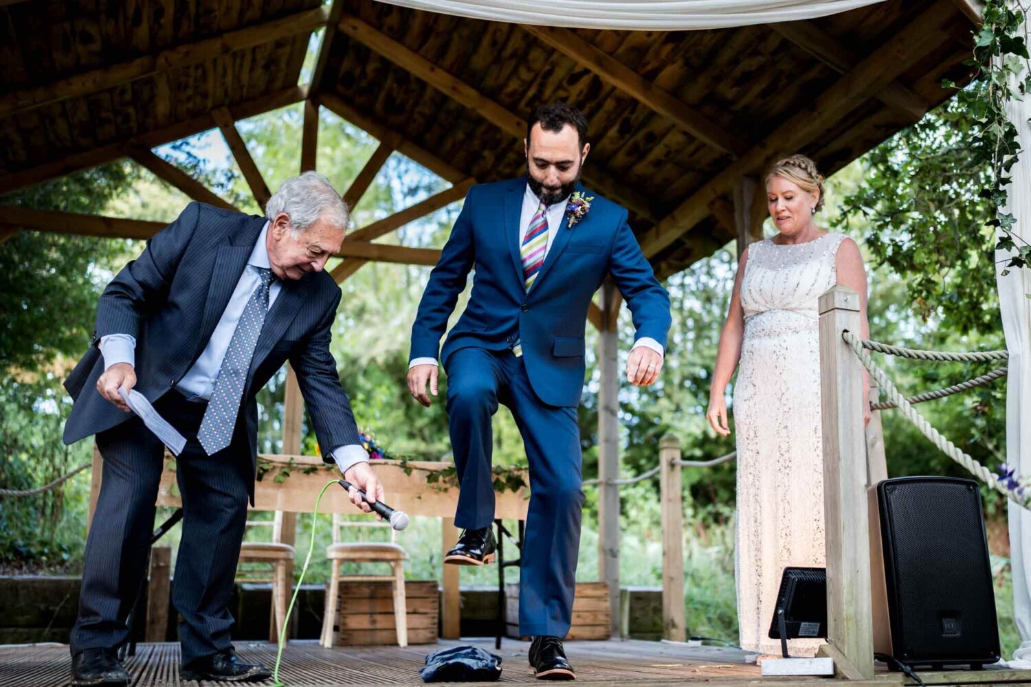 groom about to stamp on glass a jewish tradition in wedding