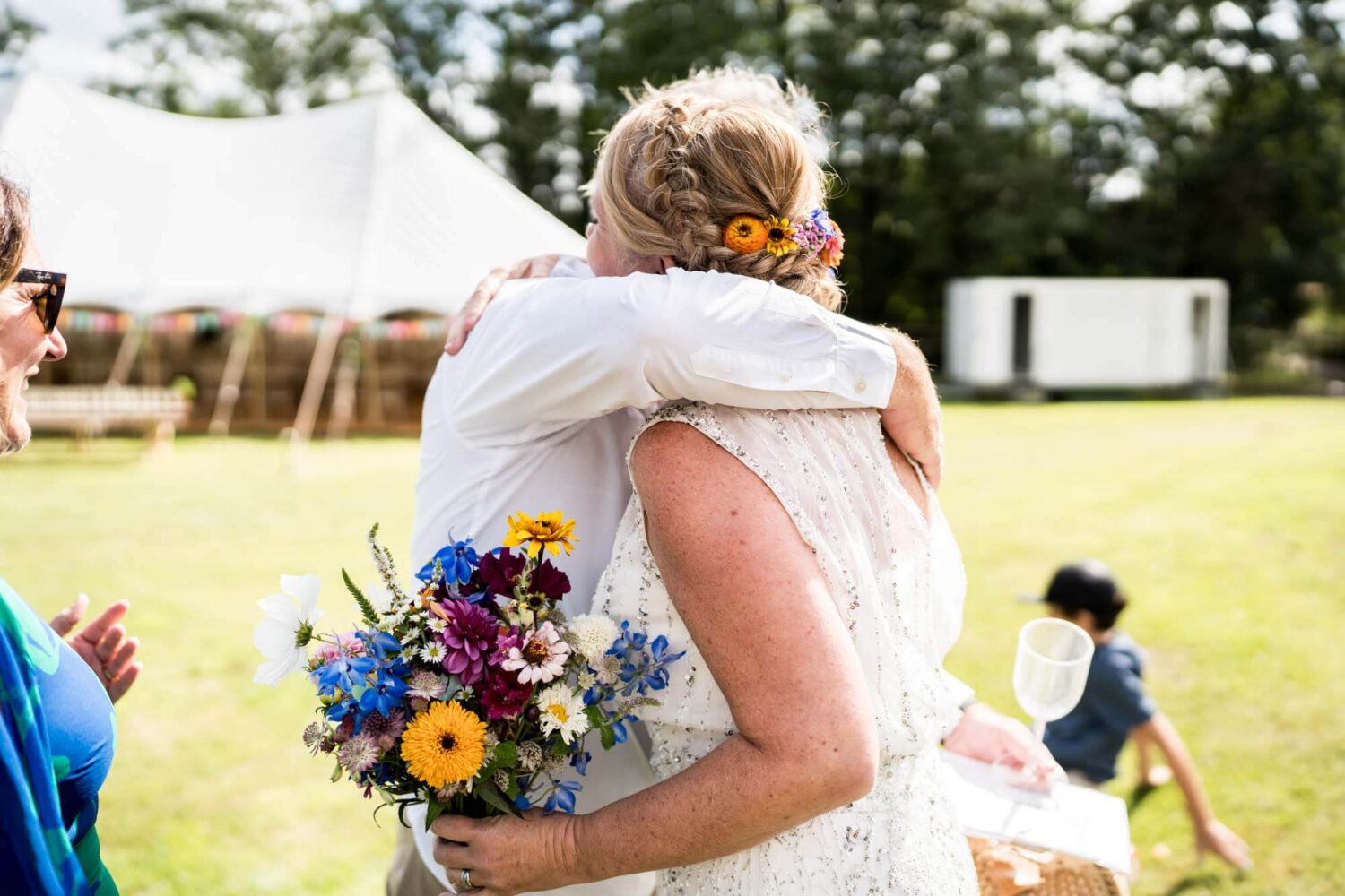 bride hugging guest