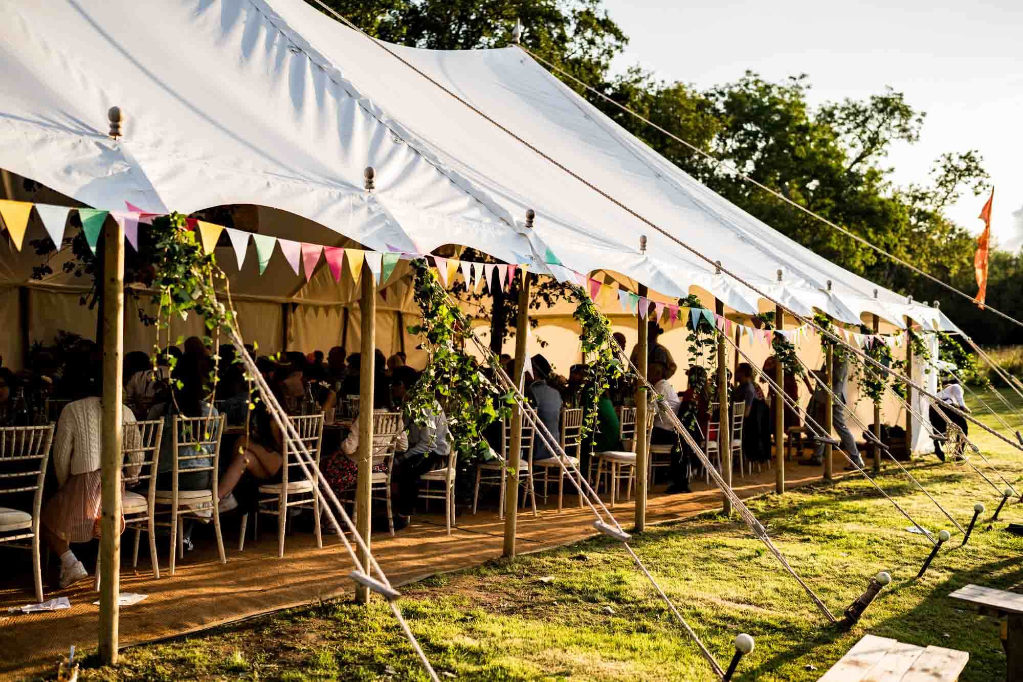 marquee with sun setting at crockstead fields