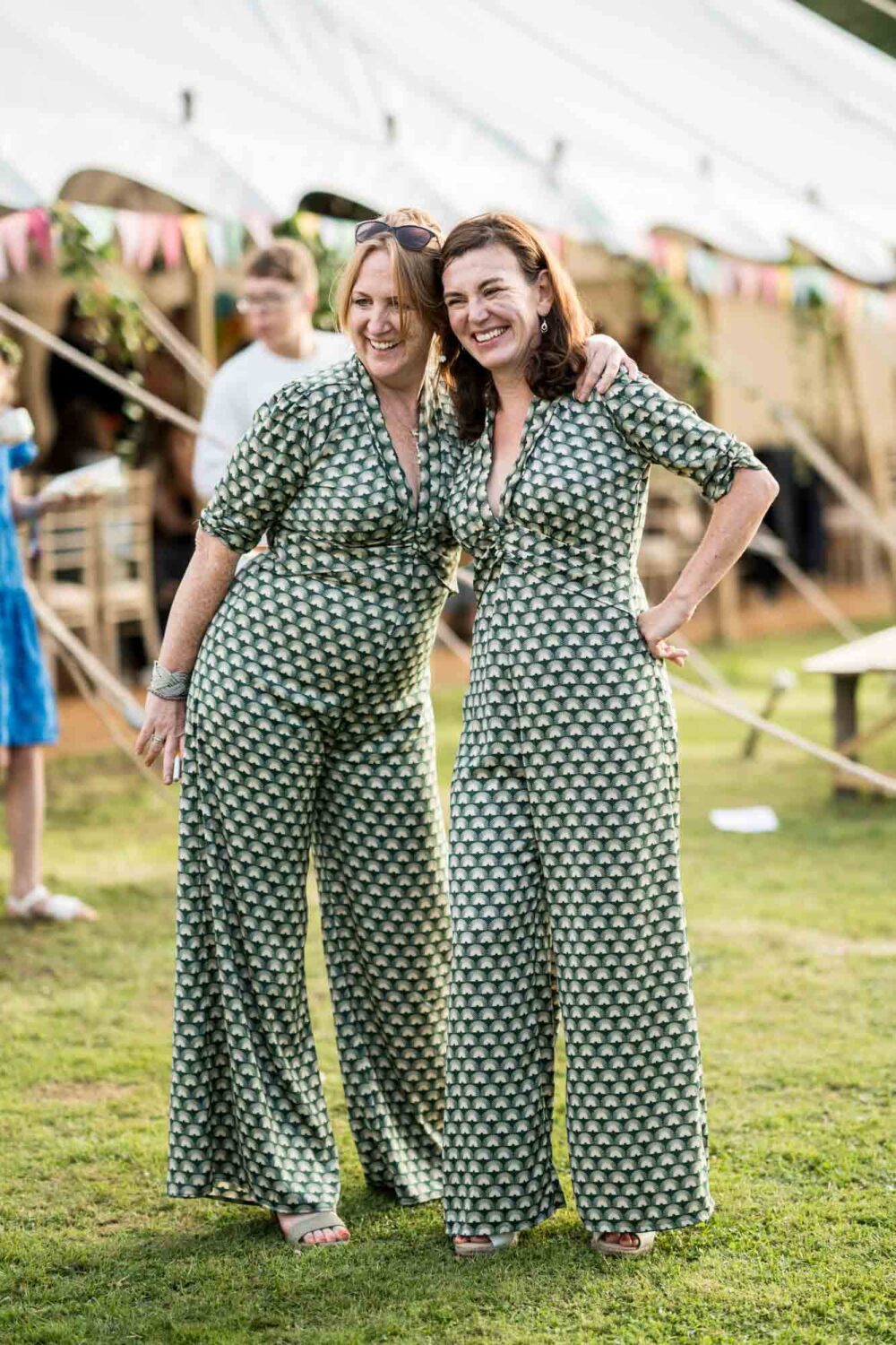 two guests in identical outfits
