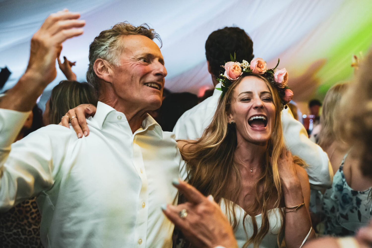 father and daughter dancing on dancefloor