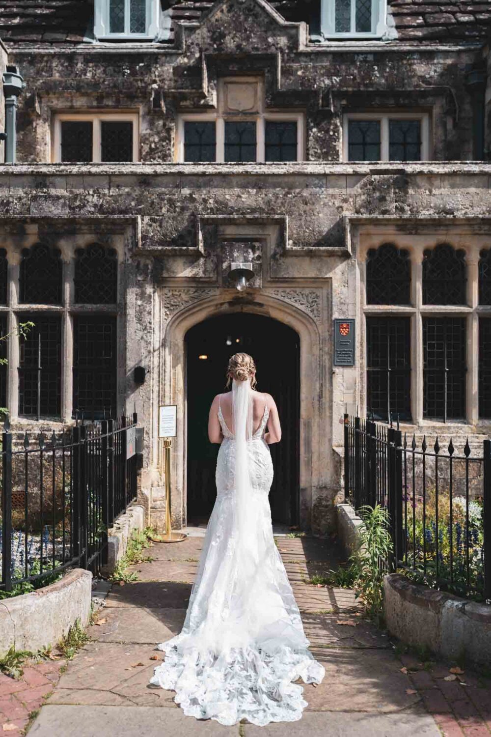bride about to enter historic building