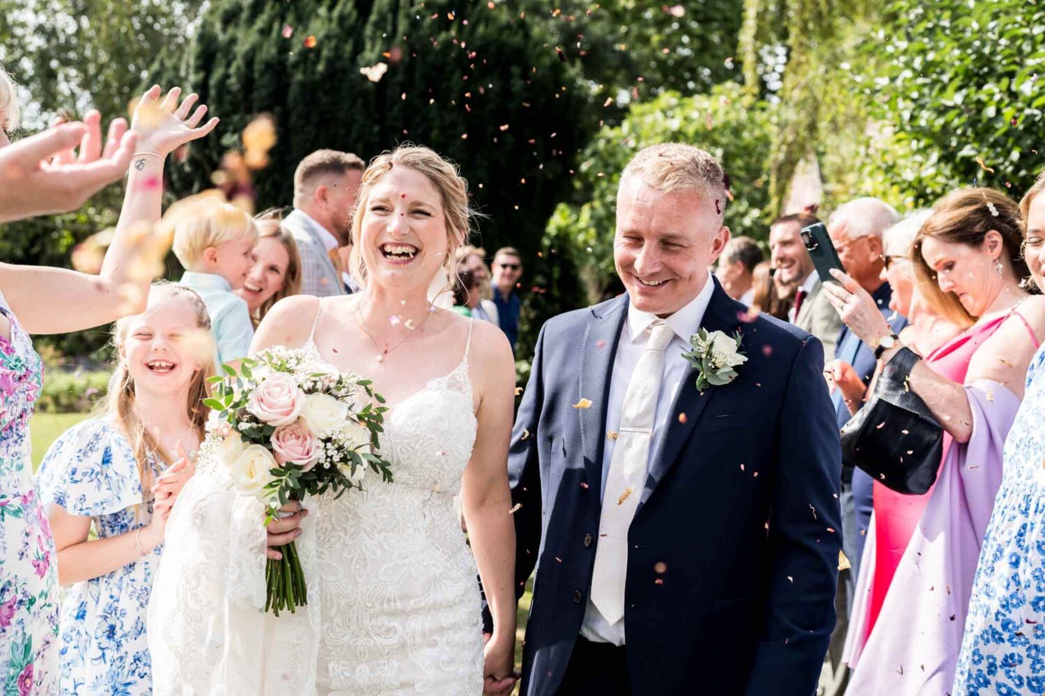 confetti shot of bride and groom
