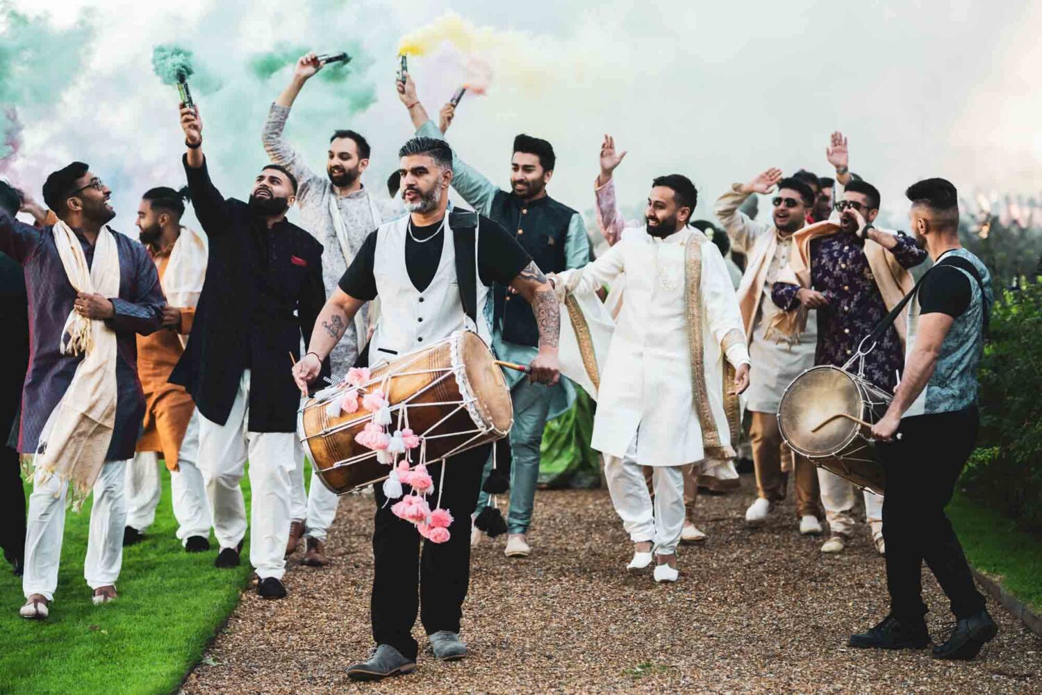 baraat procession with drums and smoke bombs at firle place