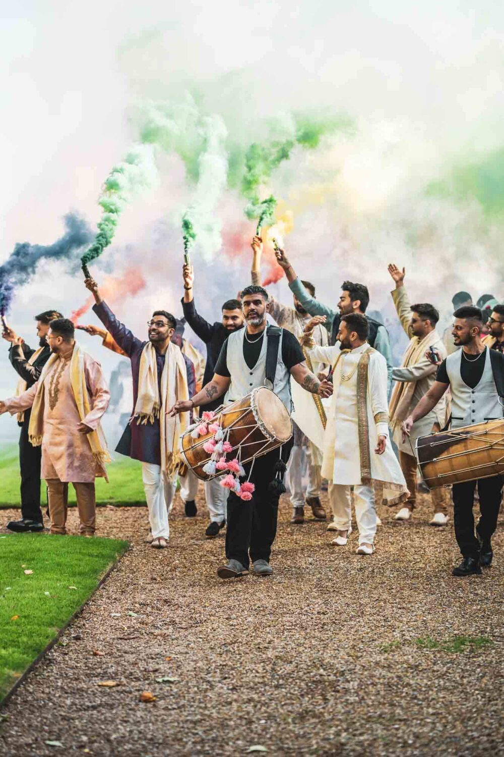 baraat procession with drums and smoke bombs at firle place
