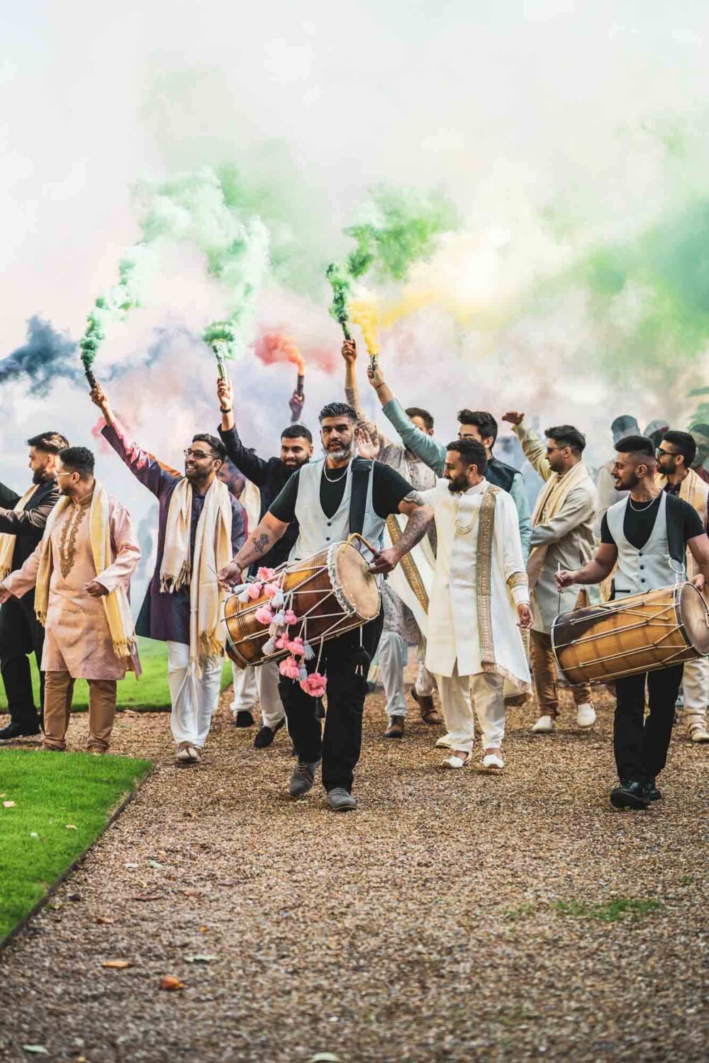 baraat procession with drums and smoke bombs at firle place