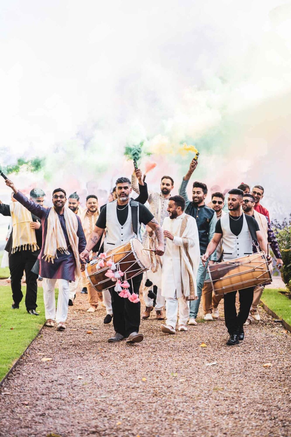 baraat procession with drums and smoke bombs at firle place