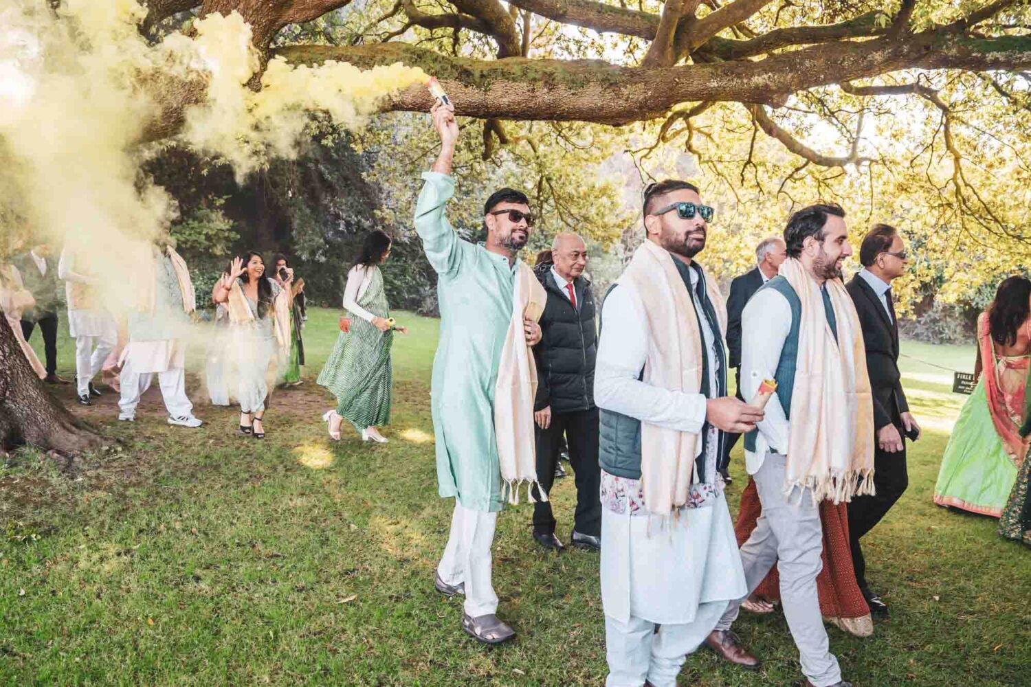 baraat procession with drums and smoke bombs at firle place