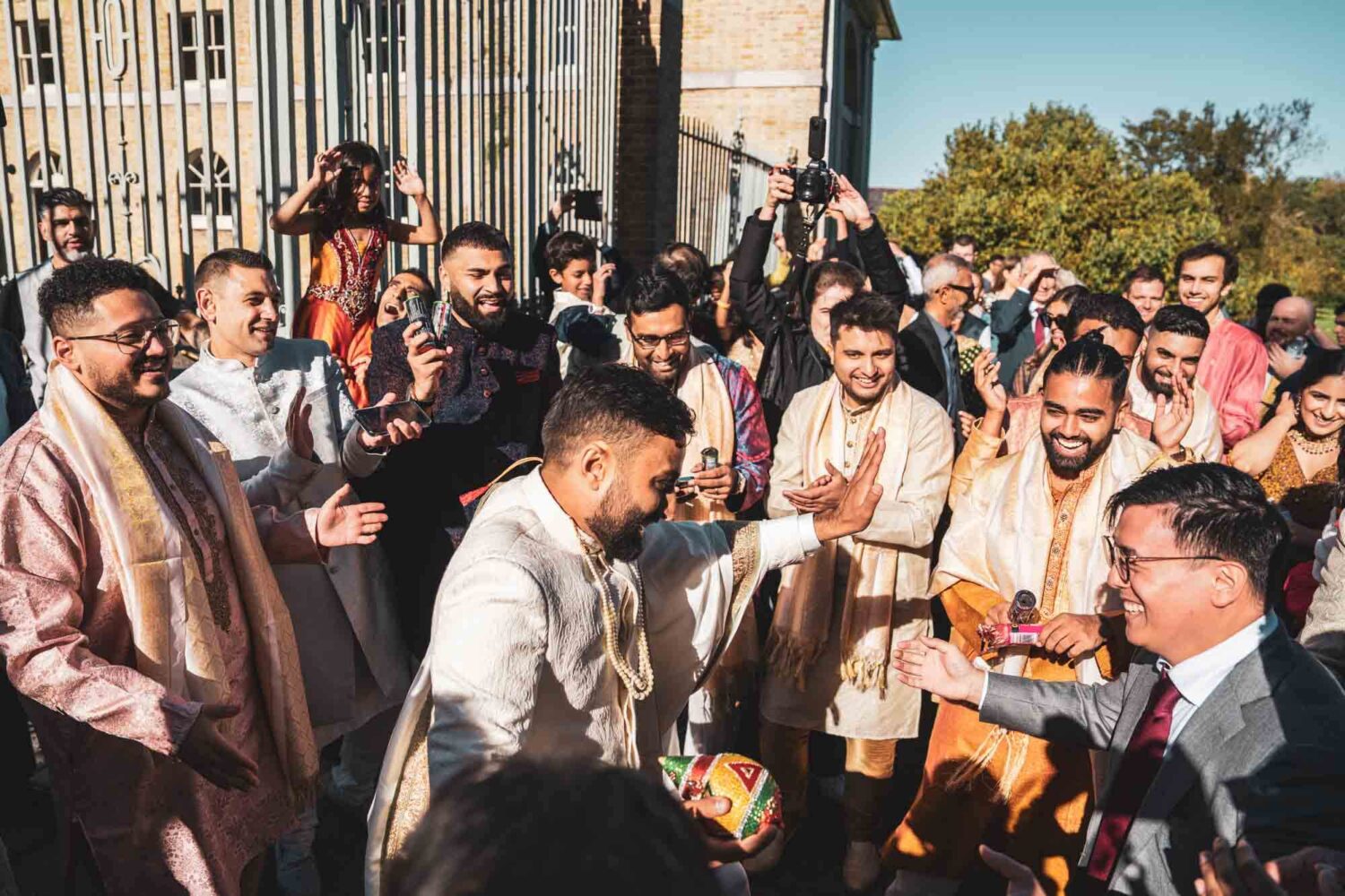 groom partying at baraat at firle place