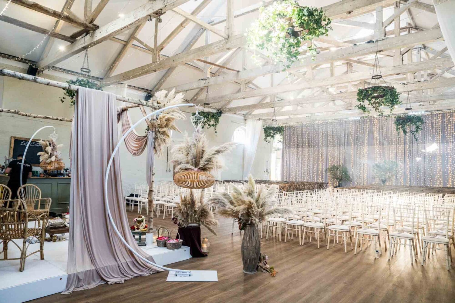 inside of riding school at firle place with boho inspired mandap