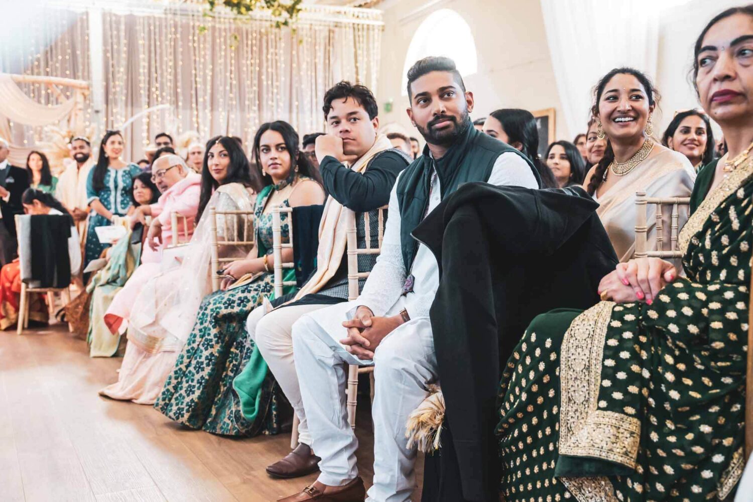 guests looking towards mandap at firle place