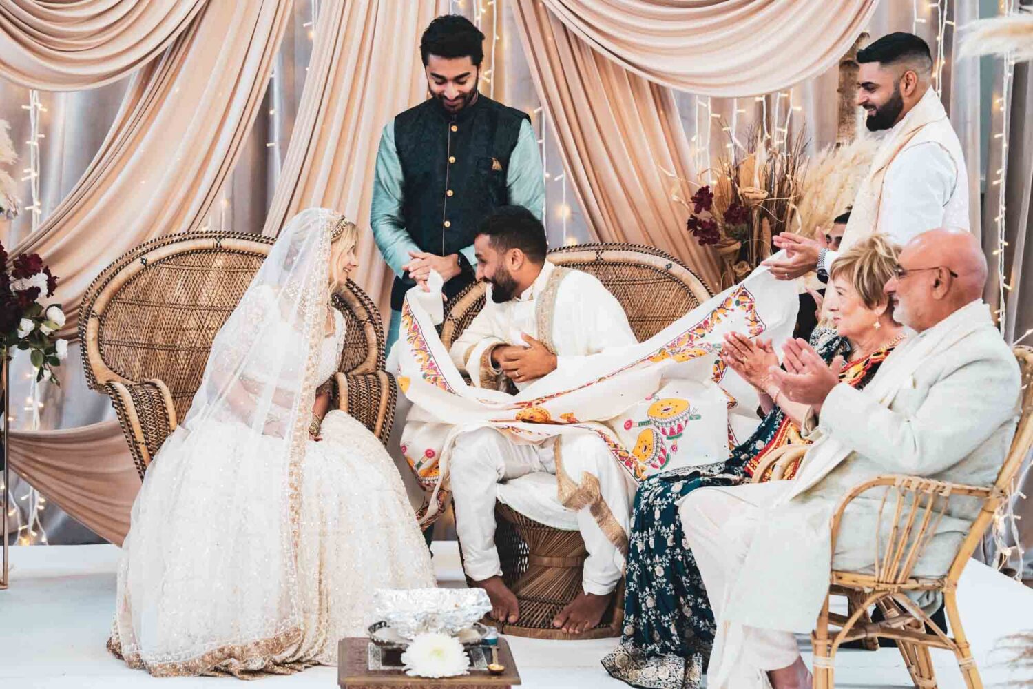 groom and bride seeing each for first time at hindu ceremony at firle place