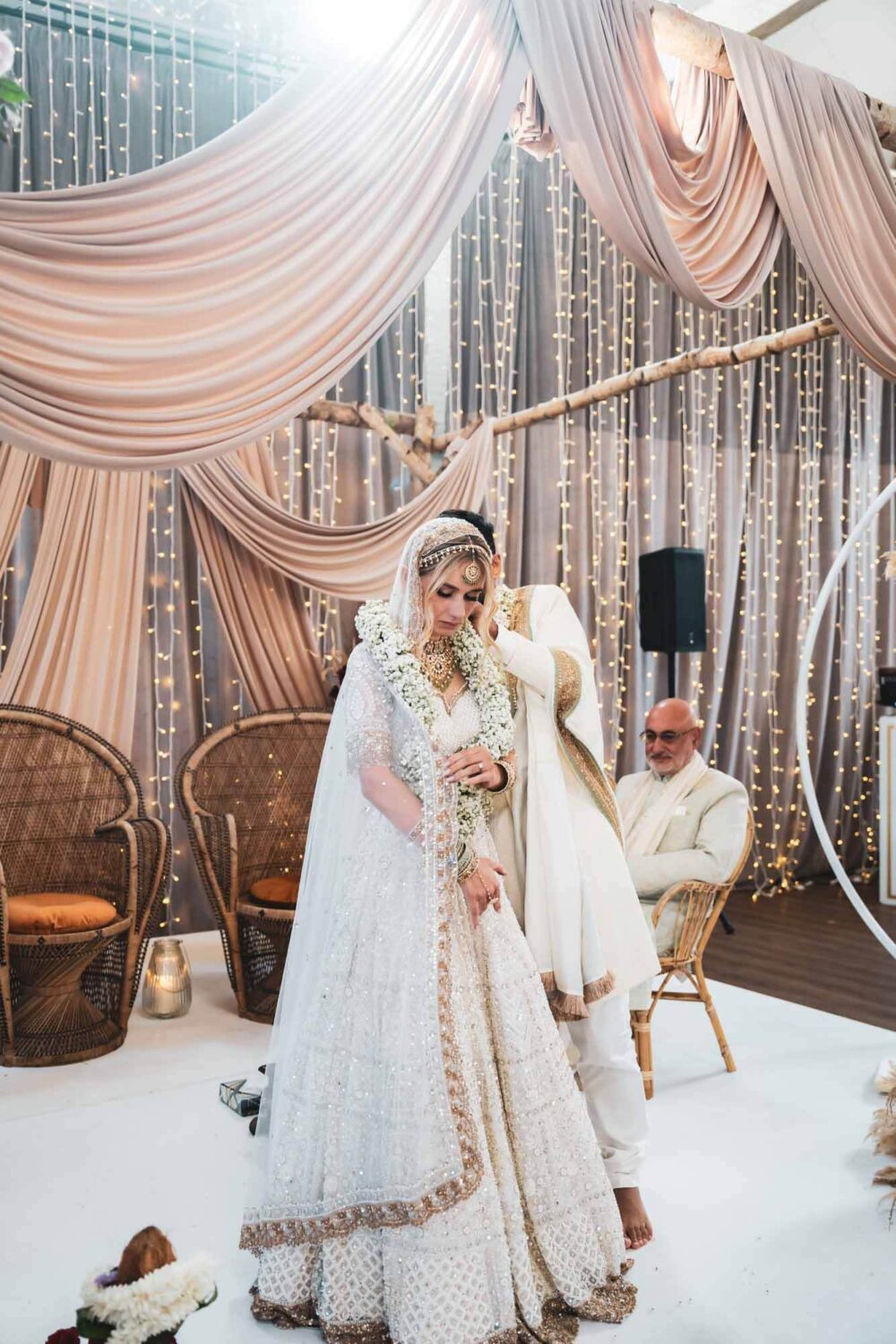 bride standing on mandap at firle place