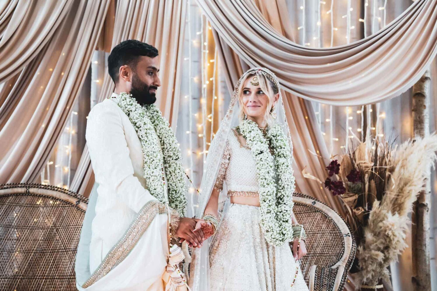 bride looking towards groom on mandap at firle place