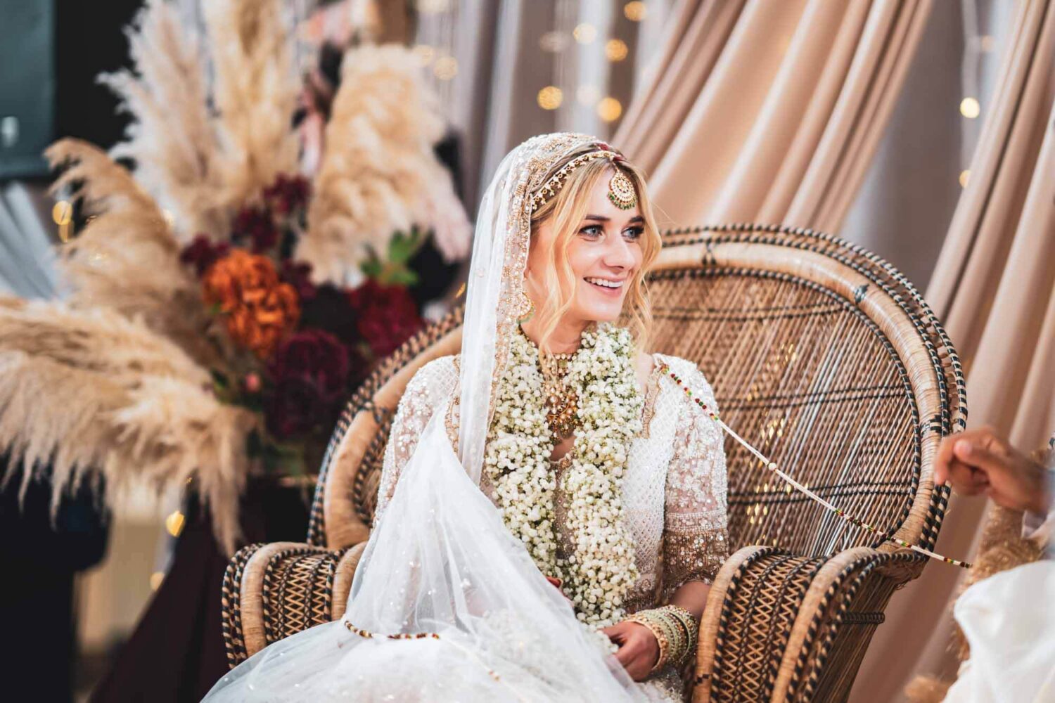bride smiling at mandap at firle place