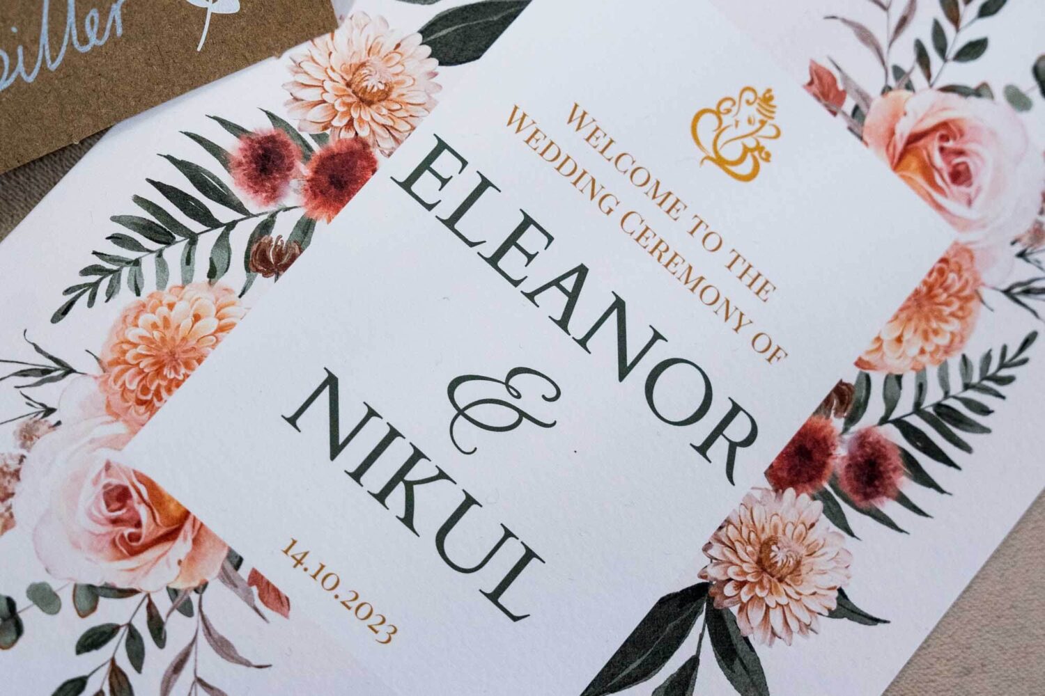 close up on fusion wedding invitation at firle place