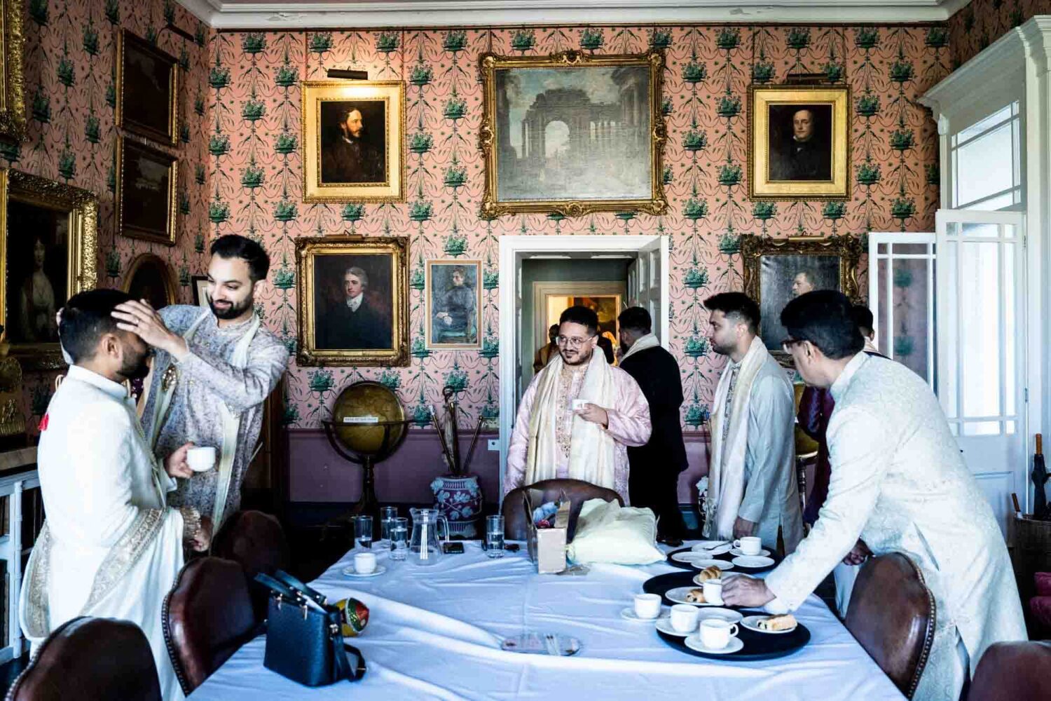 groom and his party getting ready at firle place