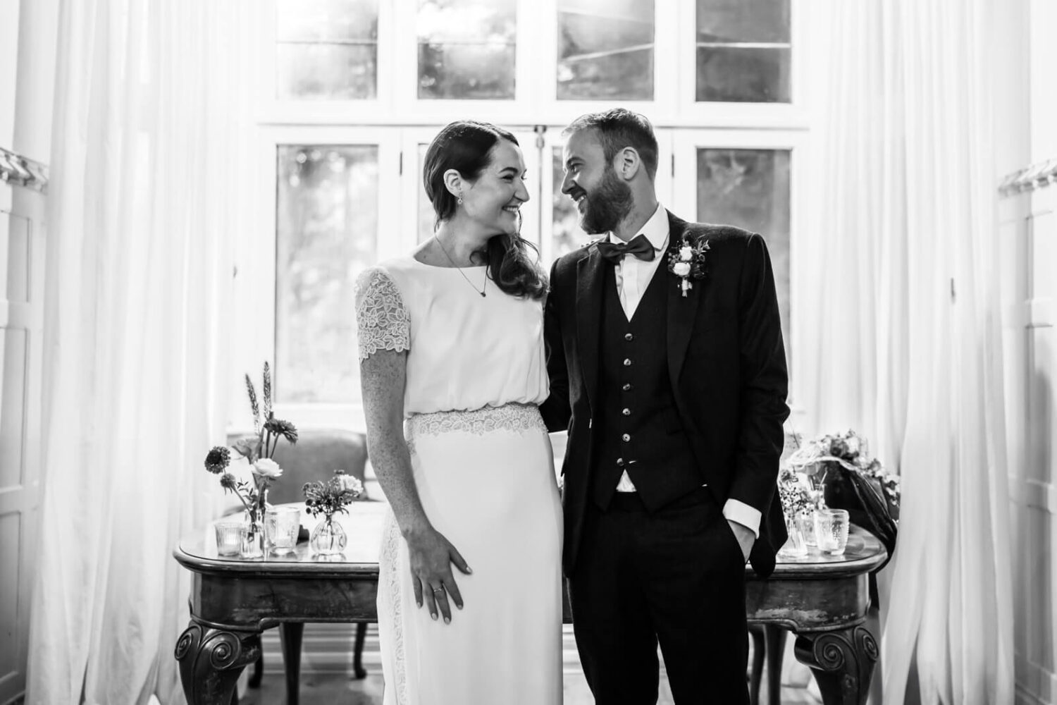 bride and groom smiling at each other after getting married at highley manor