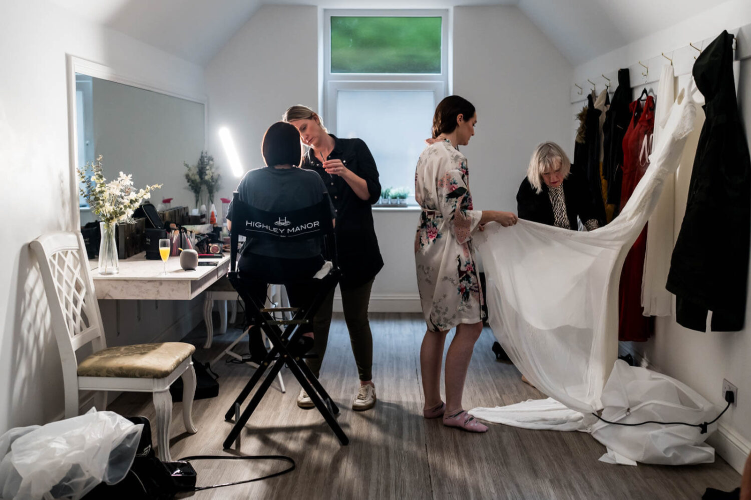 busy dressing room with bridal party at highley manor
