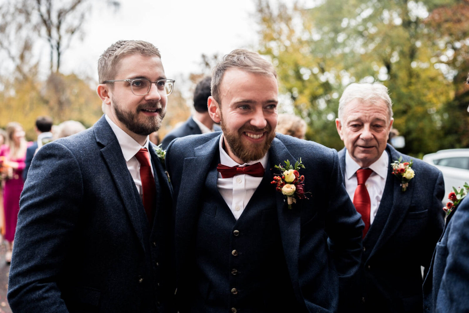 groom and his buddies smiling