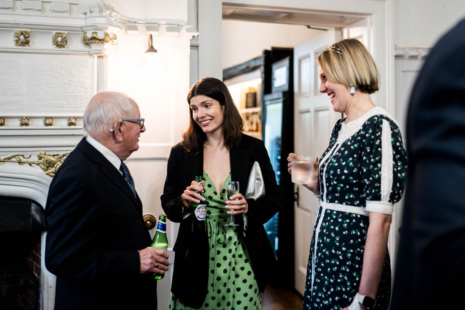 guests enjoying drink during reception