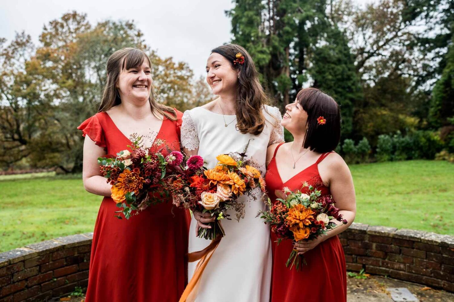 bride laughing with her bridesmaids