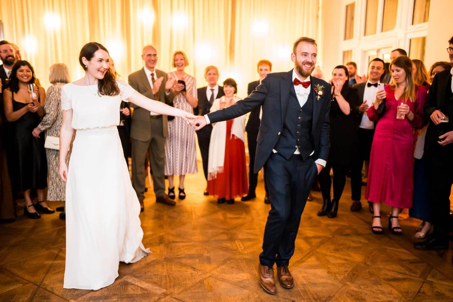 couple step onto dance floor for first dance at highley manor