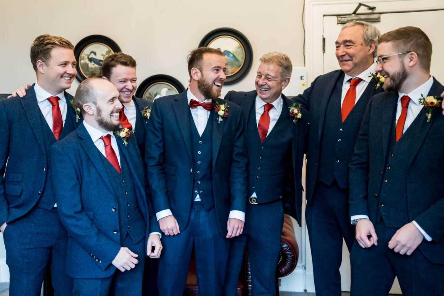 group shot of groomsmen laughing at highley manor