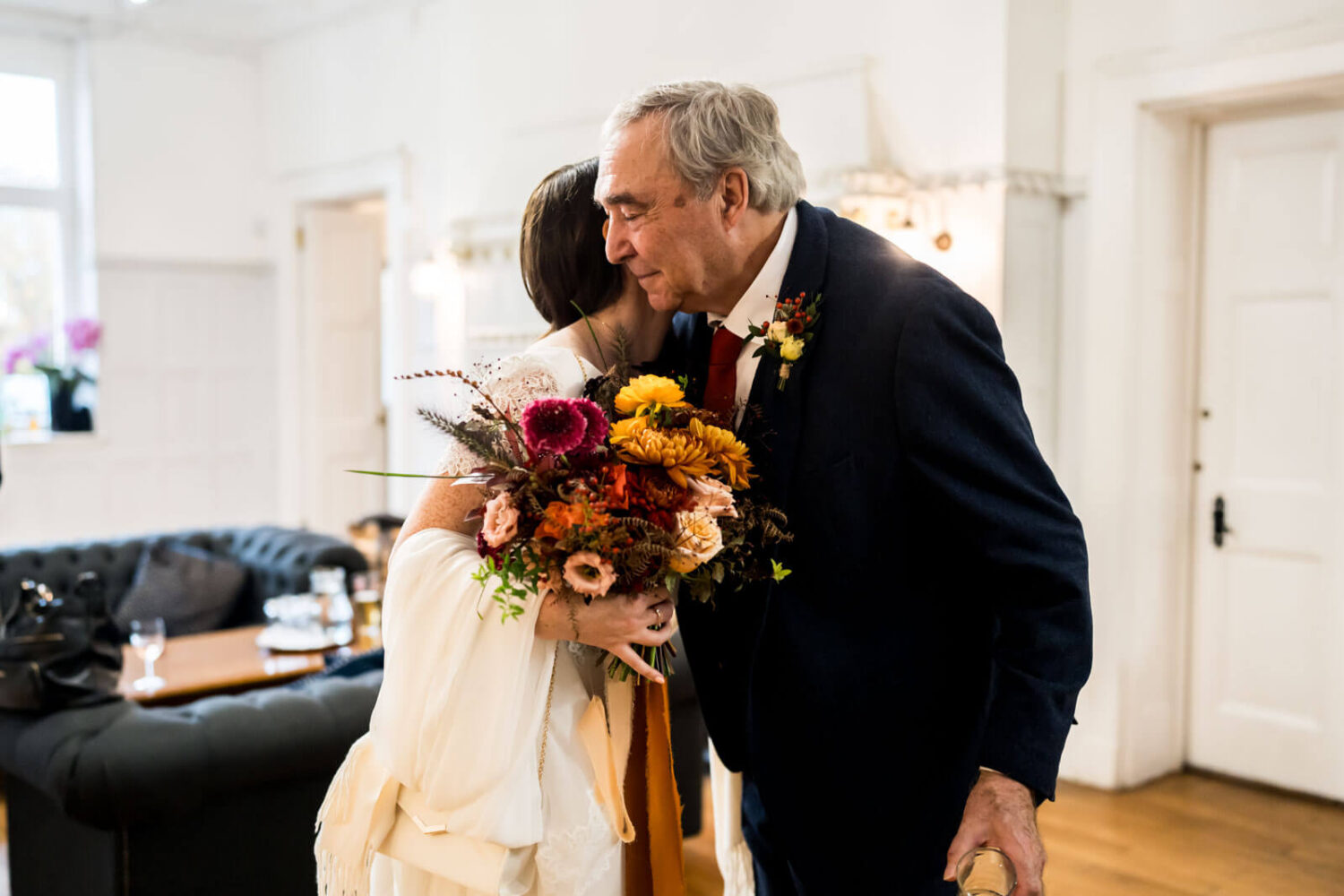 father hugging daughter at highley manor after seeing her for the first time