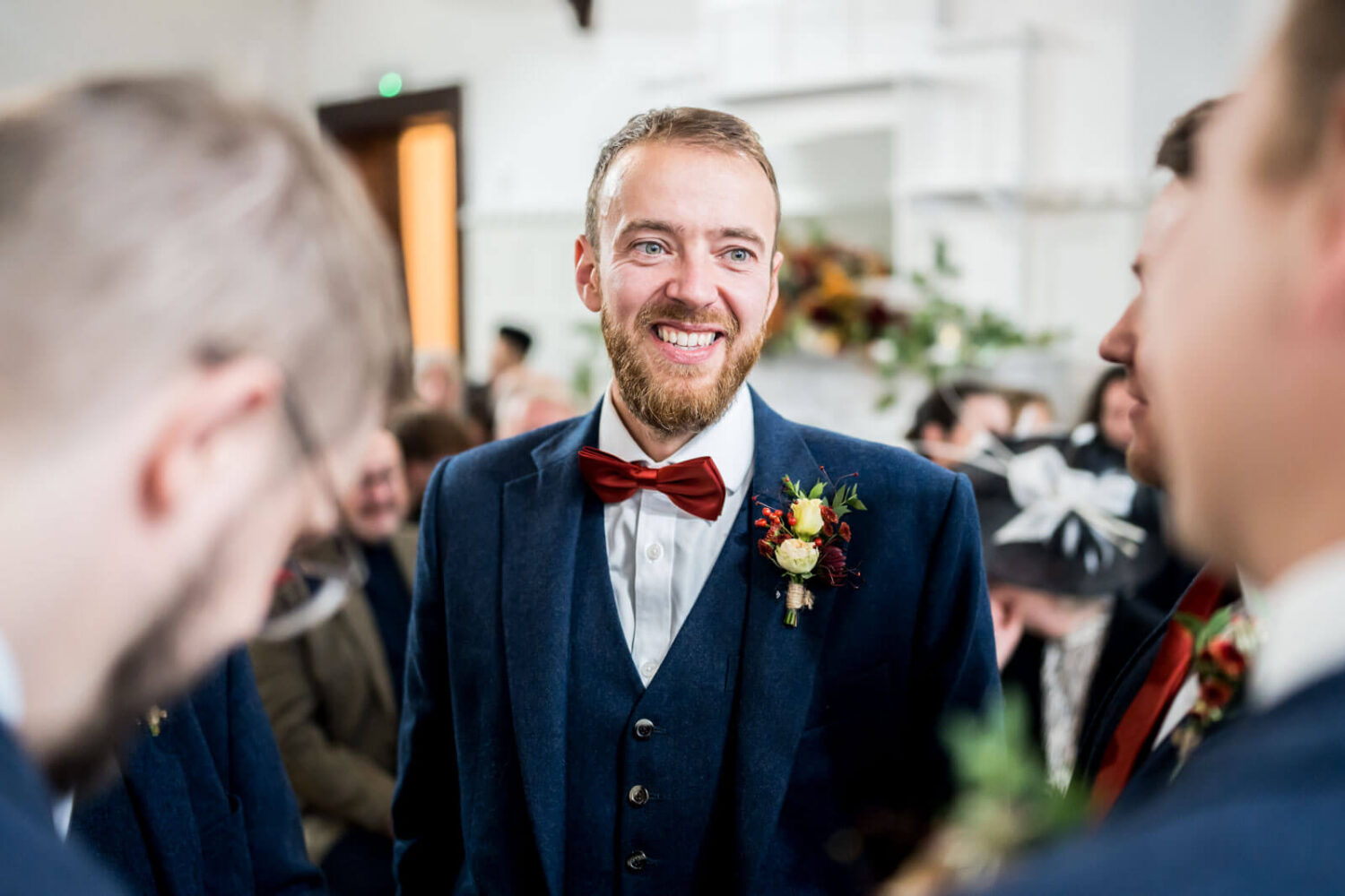 smiling groom waits for bride at highley manor