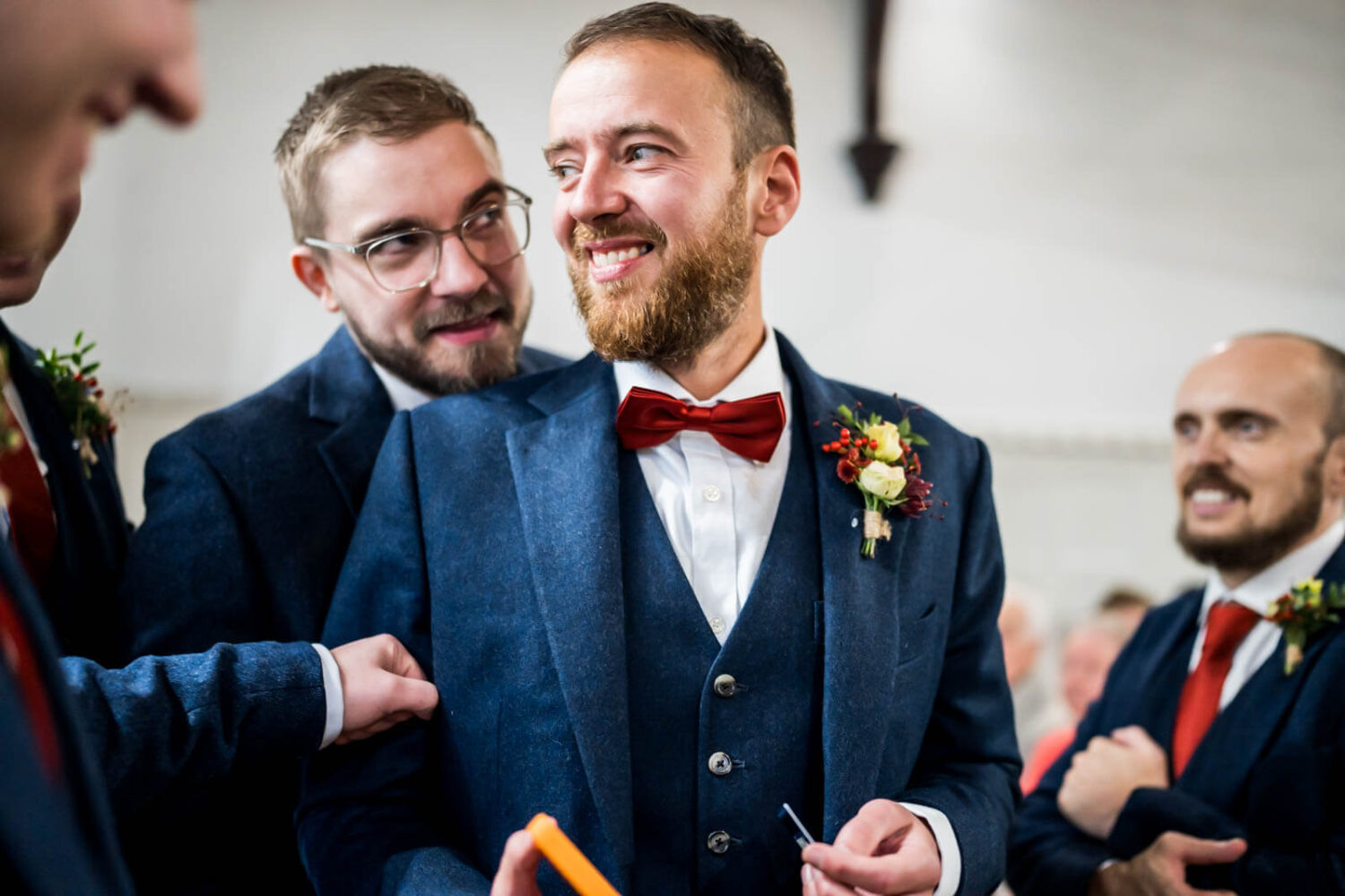 smiling groom waits for bride at highley manor