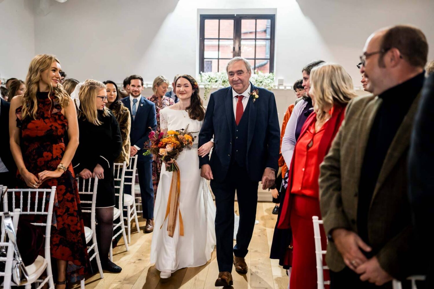 father and daughter walking down the aisle at highley manor