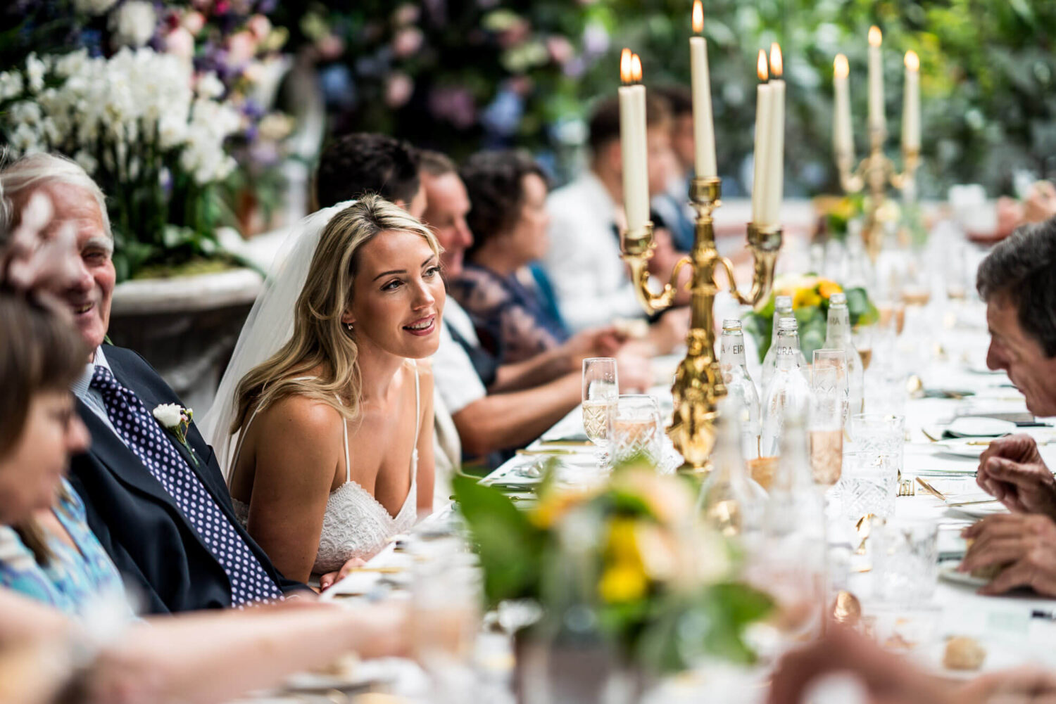 bride looking across table chelsea wedding