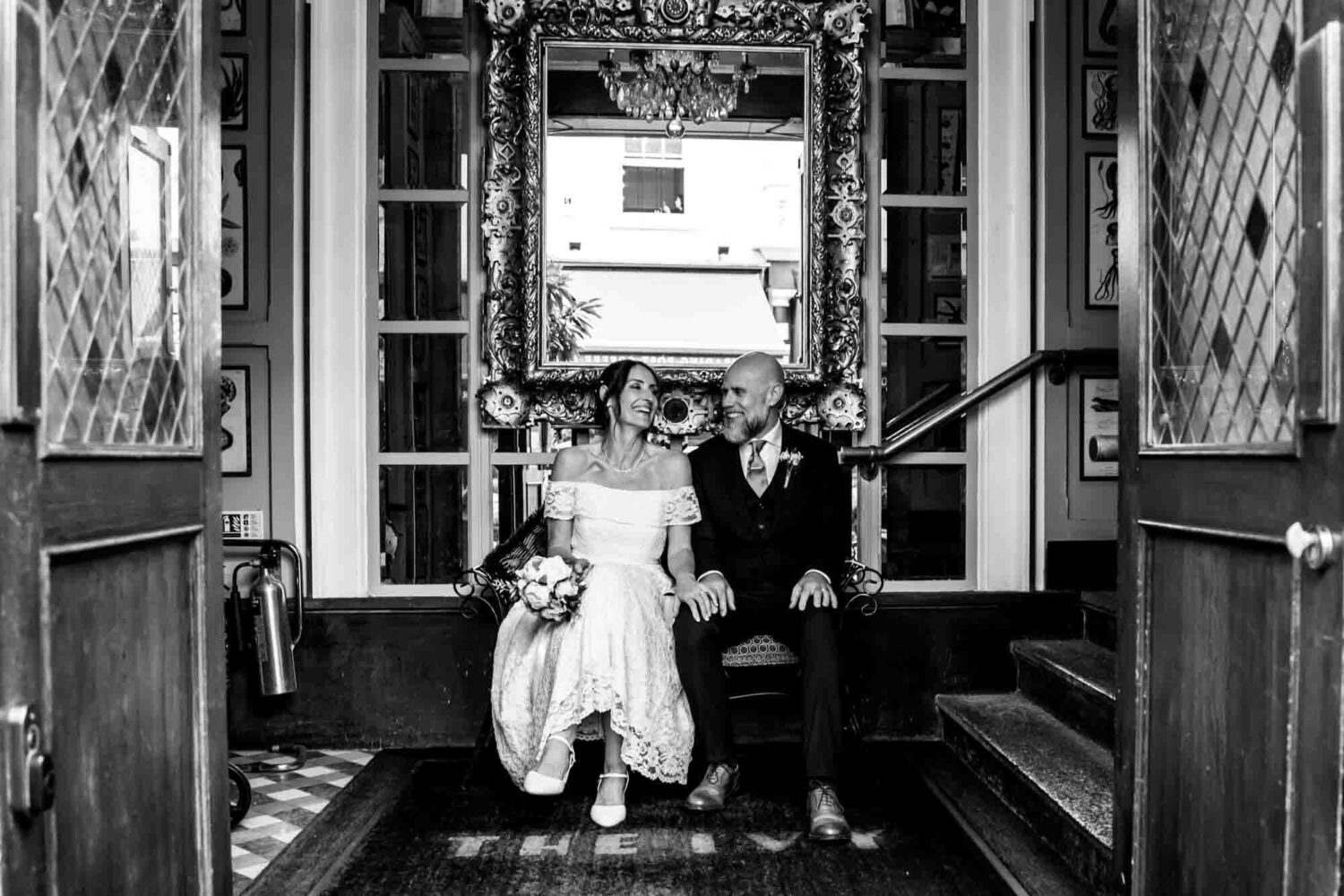 bride-groom-lapping-up-ivy-seating-brighton-town-hall-wedding