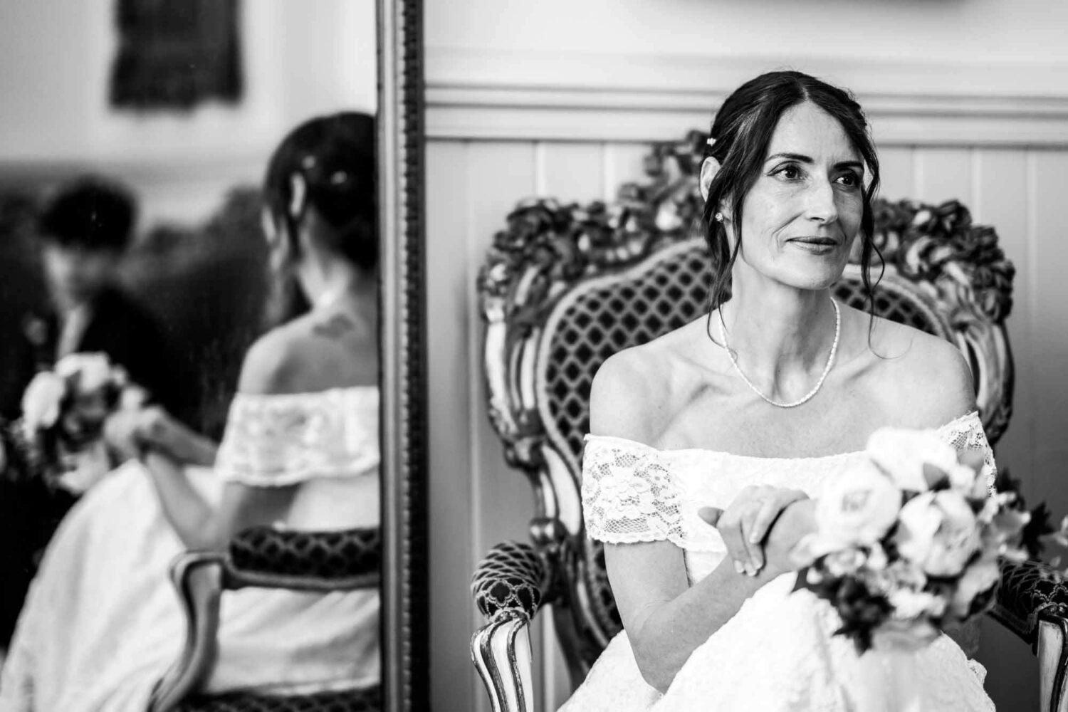 bride-and-reflection-sitting-on-chair-brighton-town-hall-wedding