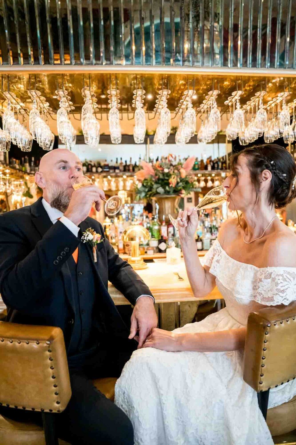 bride-groom-drinking-champayne-brighton-town-hall-wedding