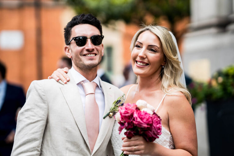 bride and groom big smiles chelsea town hall wedding