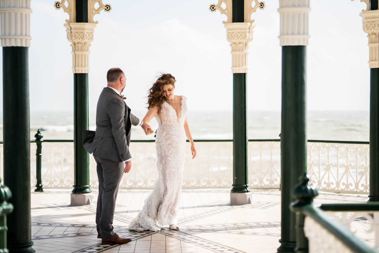 brighton bandstand wedding bride takes a dancing step with her husband