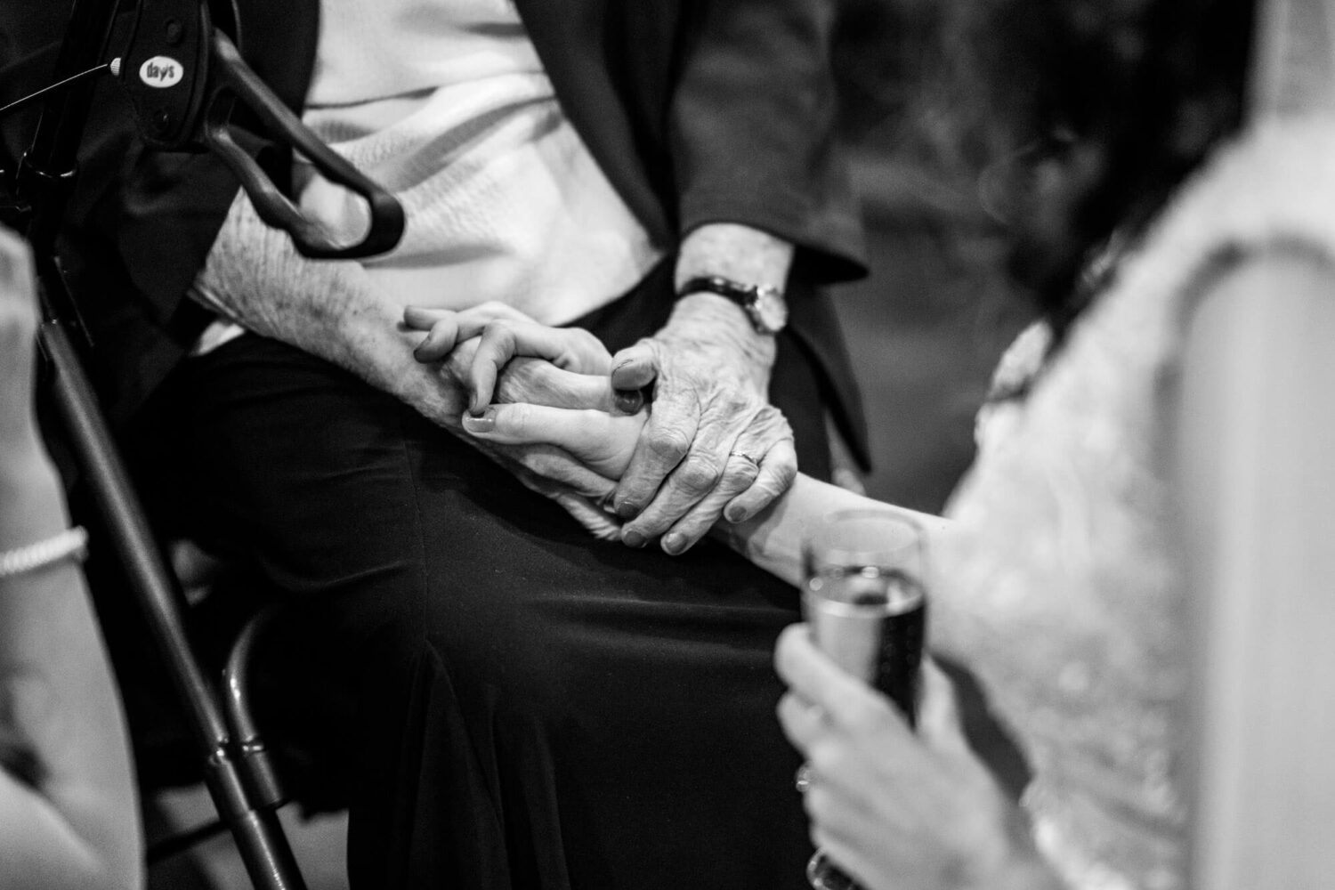 holding hands with grandma brighton wedding