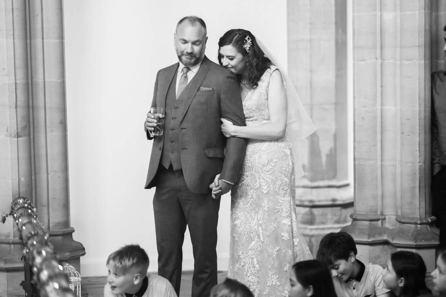 bride holding groom during speeches brighton wedding