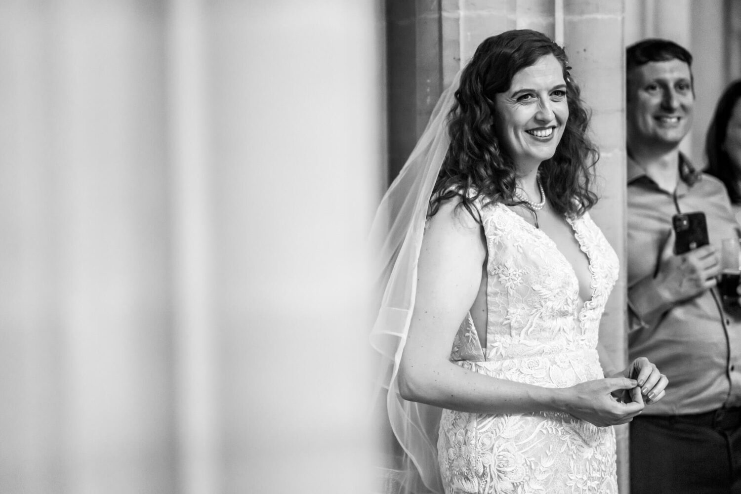 bride smiling on as she listens to speech brighton wedding