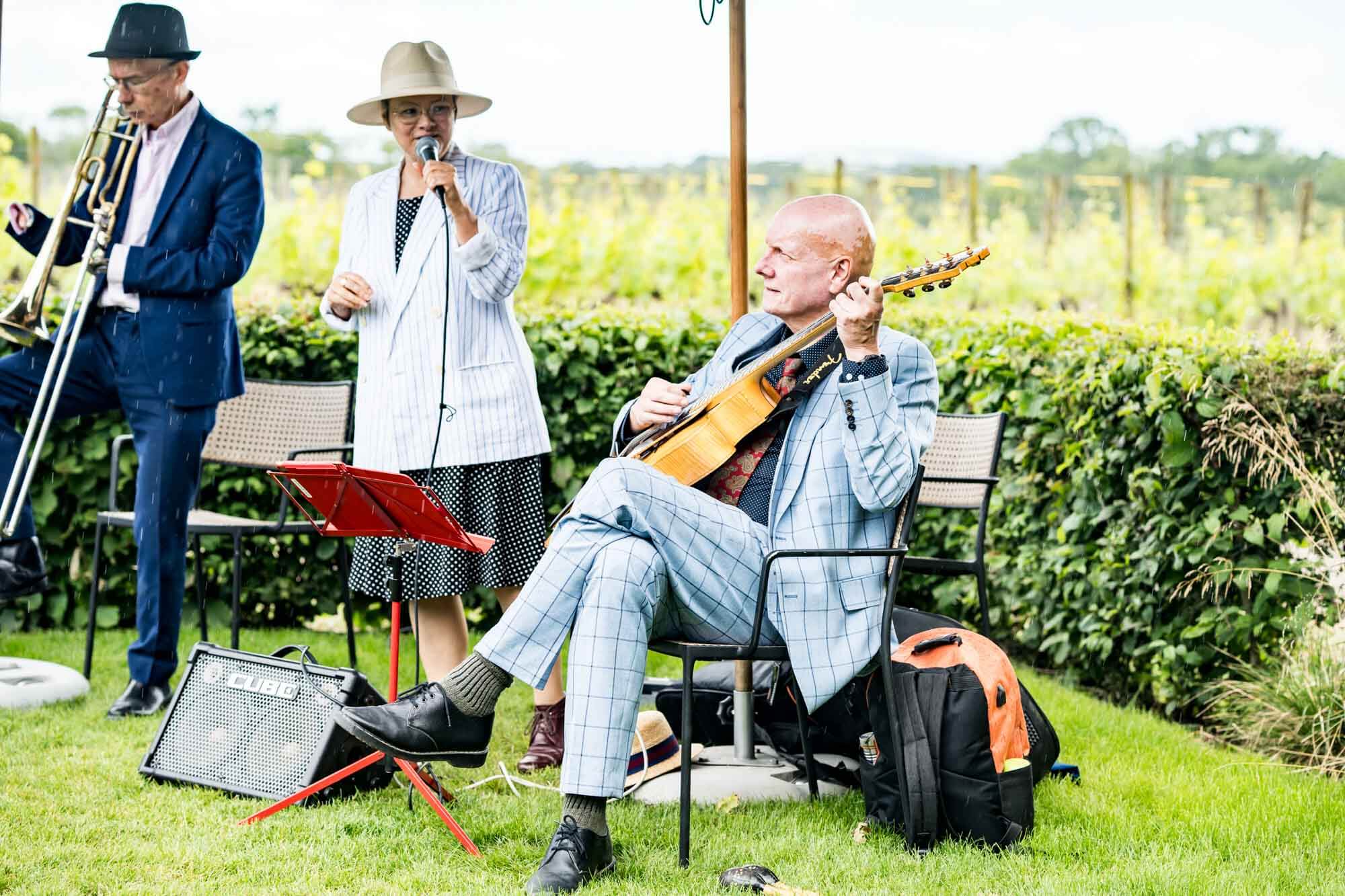 Band members playing.