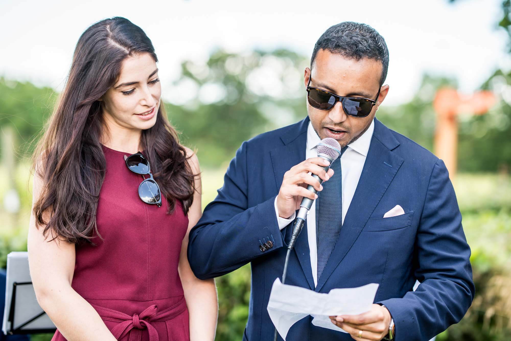 Two guests giving speech.