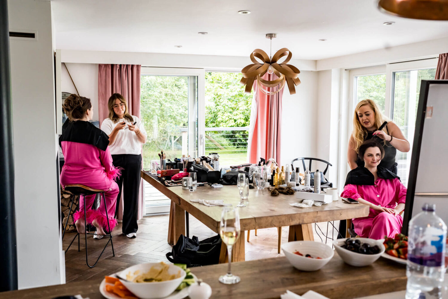 Several people getting ready pre-wedding.