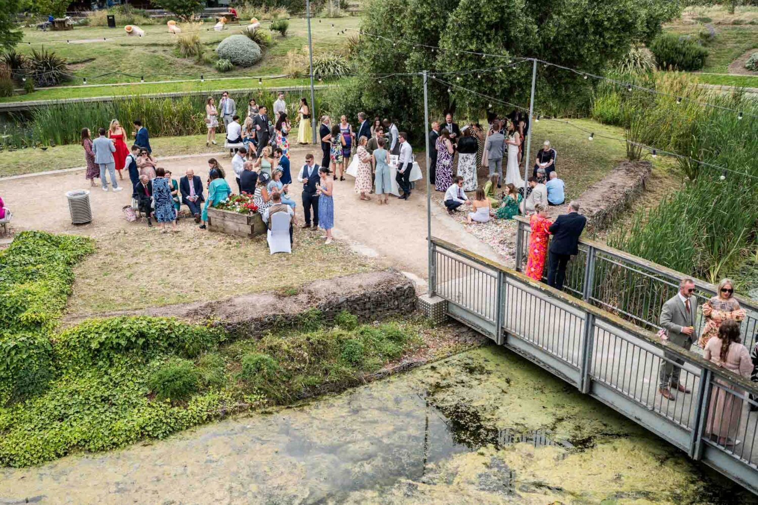 Ariel shot of venue with guests drinking.