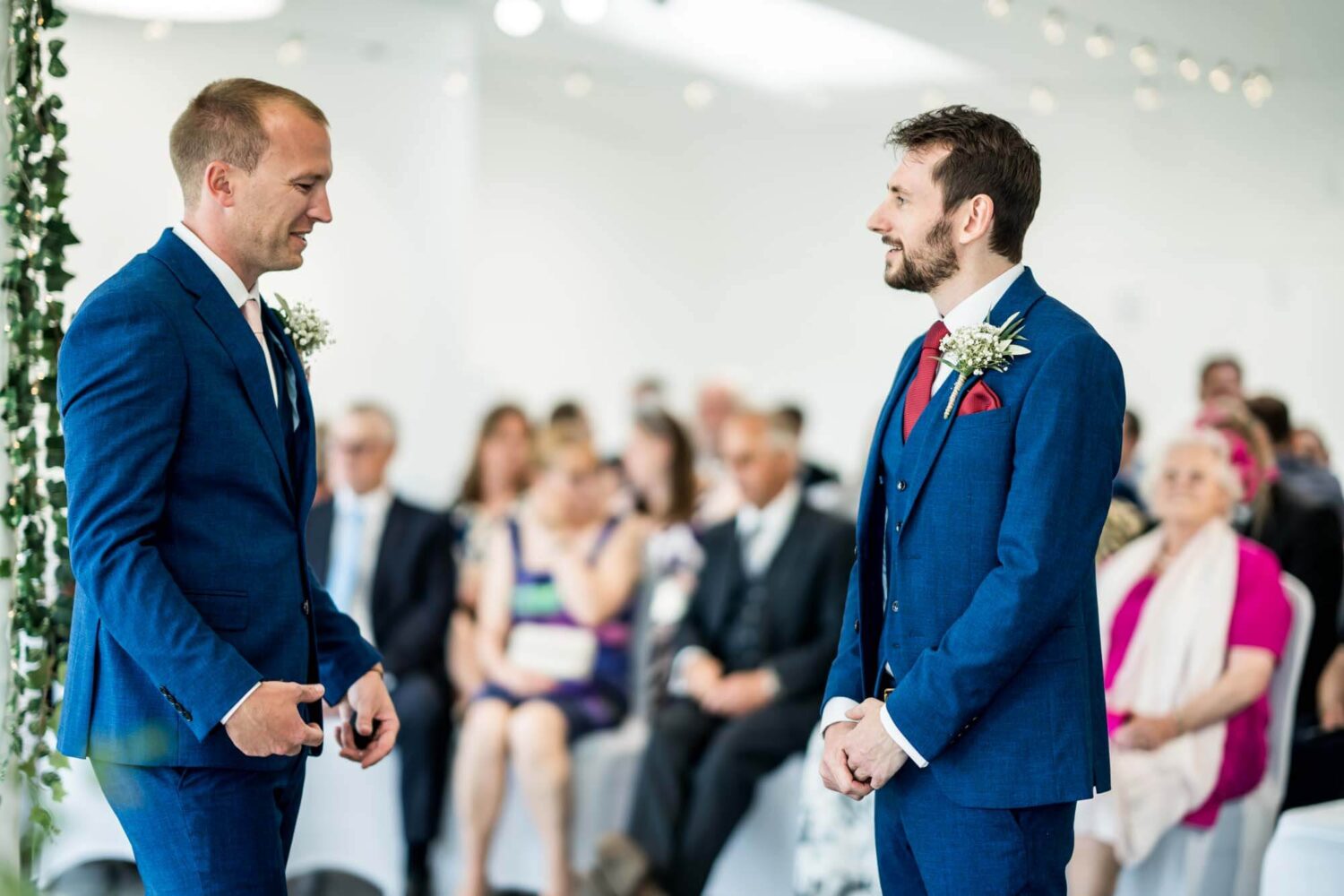Groom and best man exchanging a few words.