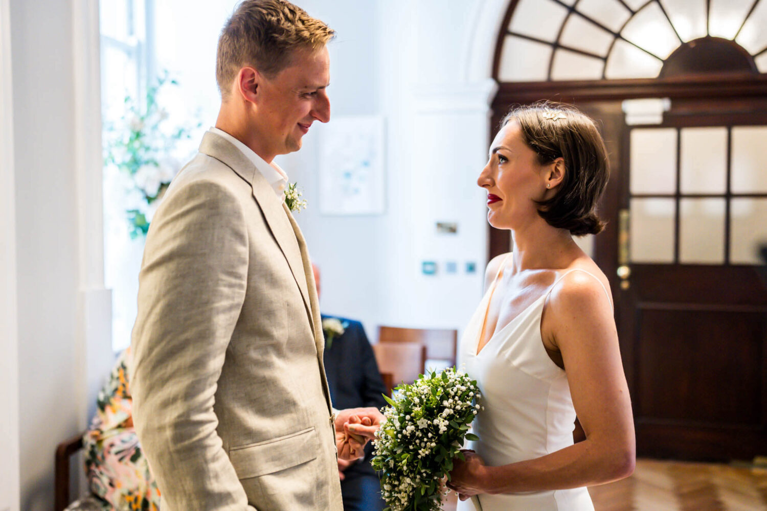 Bride and groom looking lovingly at each other Chelsea wedding.