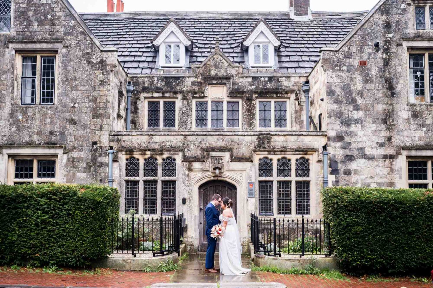 Bride and groom outside Southover grange registry office Lewes wedding.